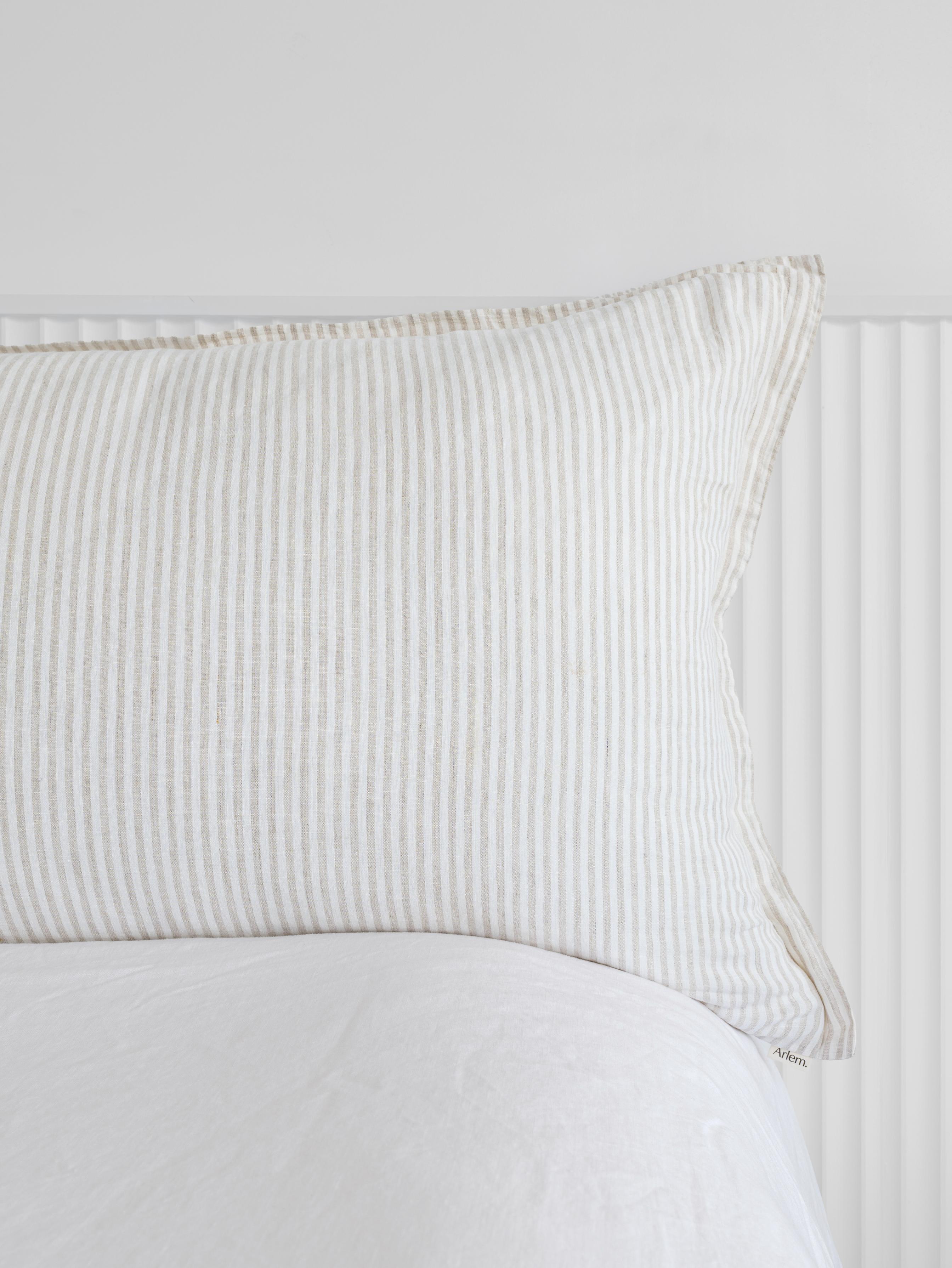 Oat stripe linen cover detail on an Arlem Bedhead Cushion